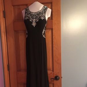 Sequined prom dress with slit on side. Worn once